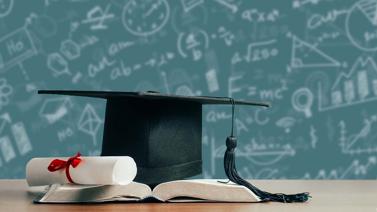 Scholarships | Concept of education for student or student success. College and university tuition for education, investment, textbooks on the table